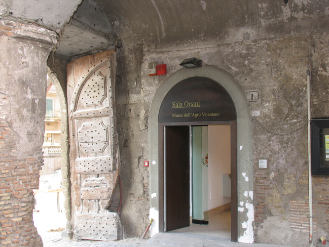 Entrance to the exhibition in Hall Orsini of Palazzo Chigi